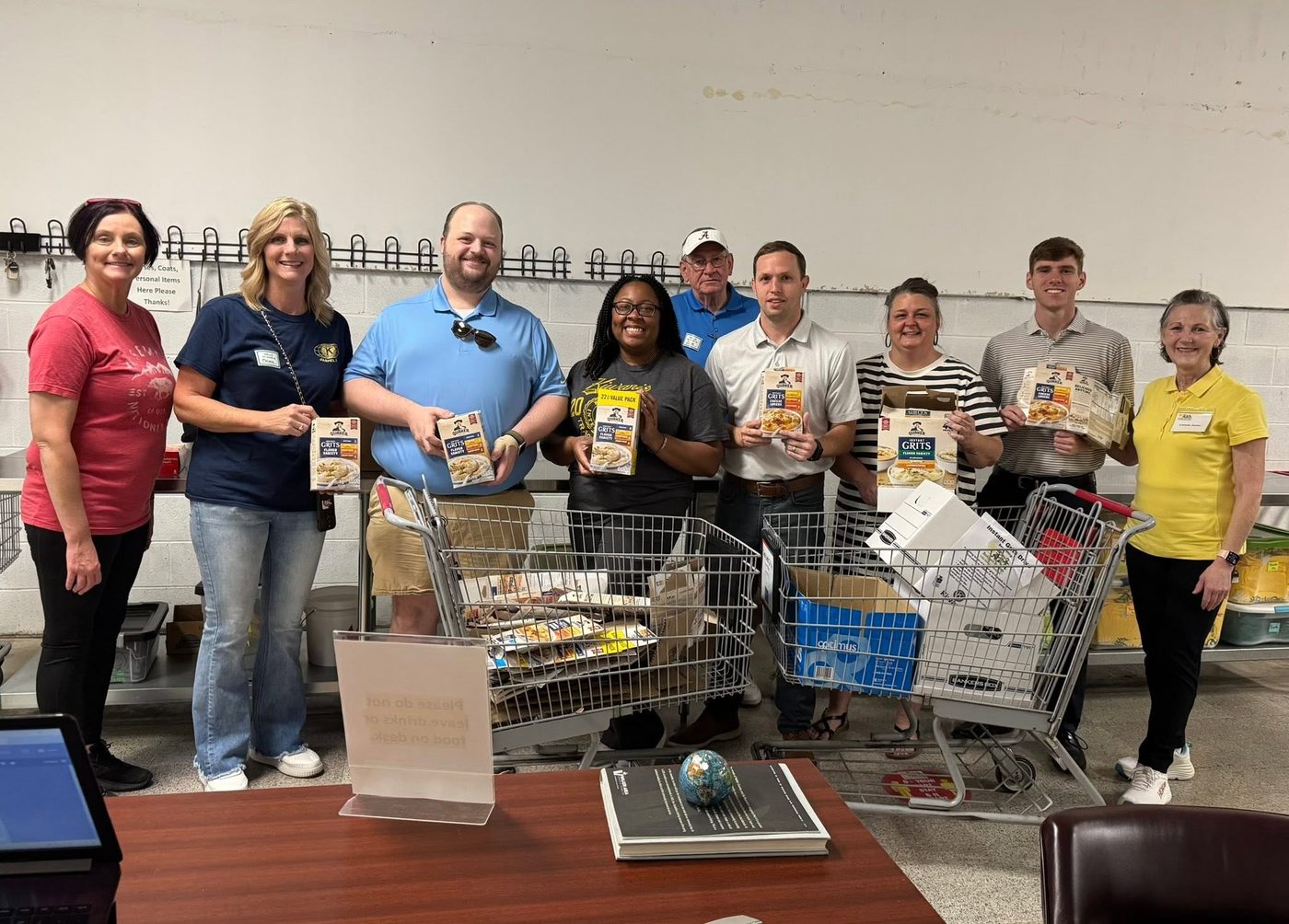 Kiwanis members volunteering with Backyard Blessings